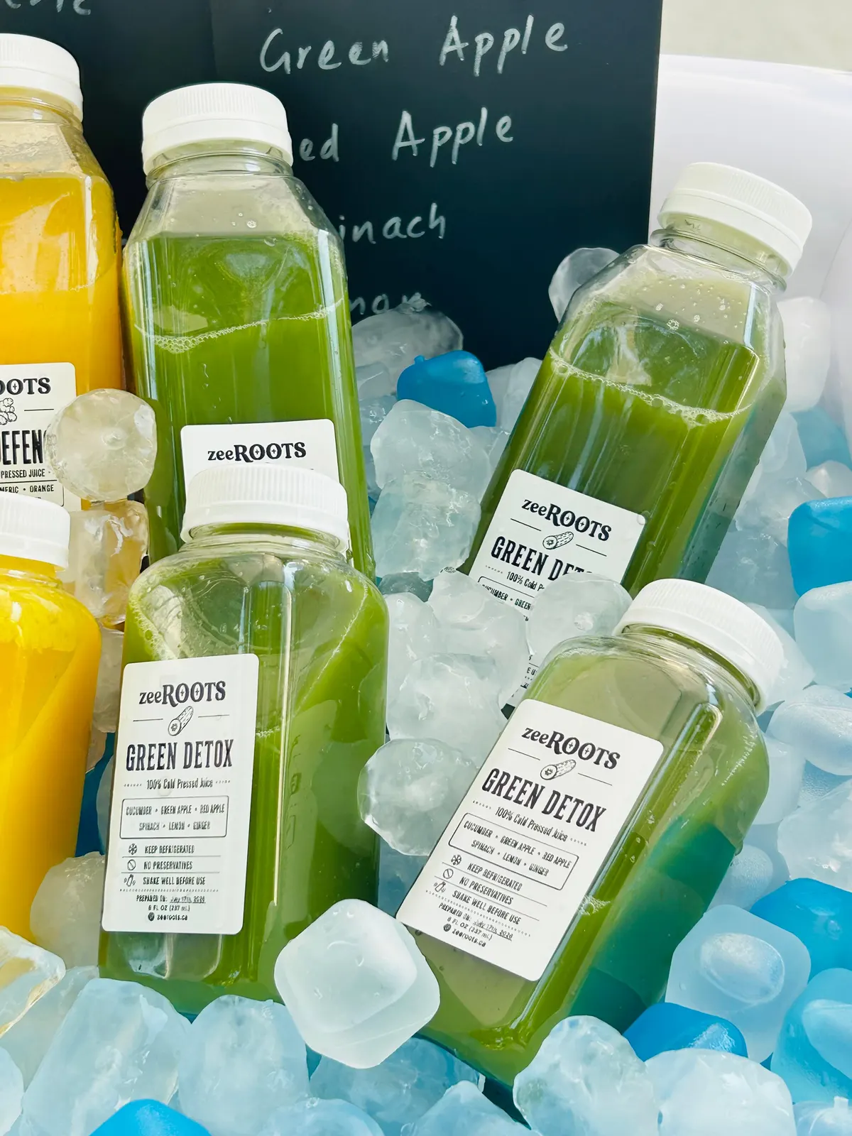 zeeROOTS market display with cold-pressed juice selections